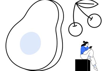 Woman Sitting While Using Tablet with Large Avocado...