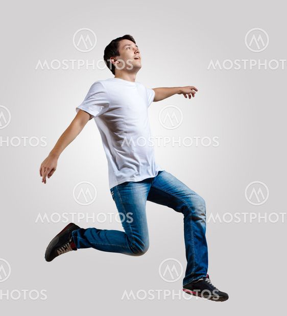 Young man dancing and jumping
