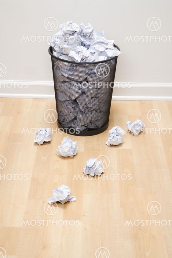 Trash can and paper.