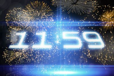 Composite image of colourful fireworks exploding on black...