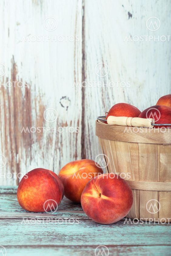 Fresh peach fruits in a basket