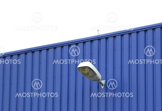 Blue wall with lamp