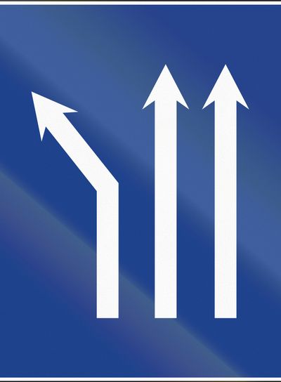 Road sign used in Spain - Fork left on three-lane...