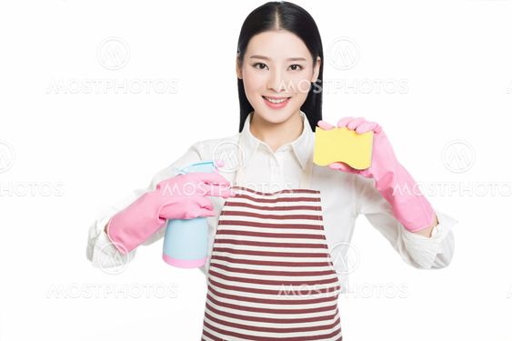 young woman cleaning on white
