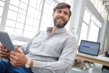 Man, thinking and worker with tablet in workplace, event...