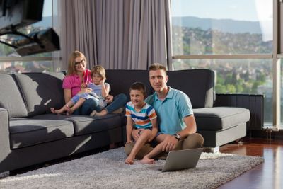 young happy family relaxing at home