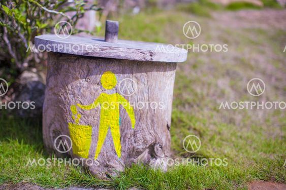 Bright rubbish bin with a pattern in tropical resort