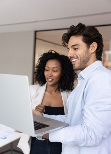 Positive multiethnic male and female co-workers...