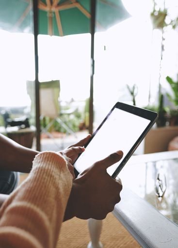 Couple, hands and browsing with tablet screen for...