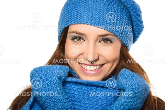 Young happy woman wearing winter cloth