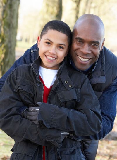 Father And Son On Autumn Walk