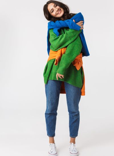 Full length image of caucasian woman 30s in colorful...