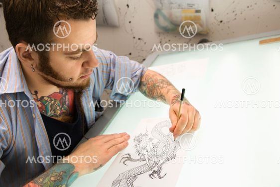 Tattoo artist.