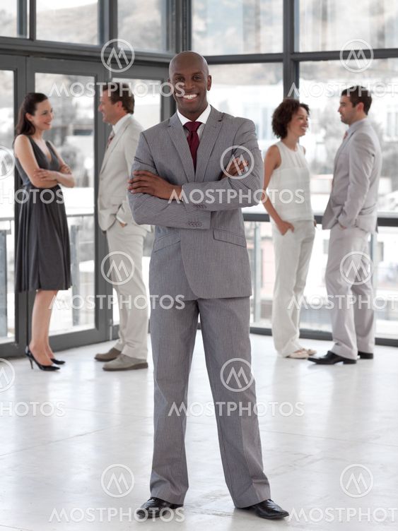 portrait of an afro manager leading his team