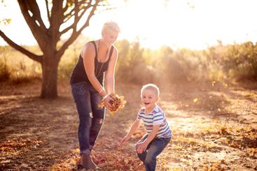 Having so much fun. A mother and son being playful and...