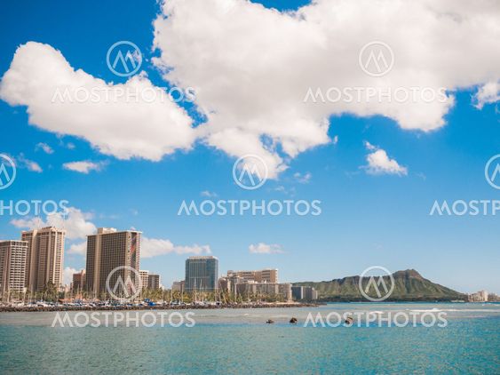 HONOLULU, HAWAII - FEB 2: View of Waikiki Yacht club from Ala Moana beach park with buildings behind