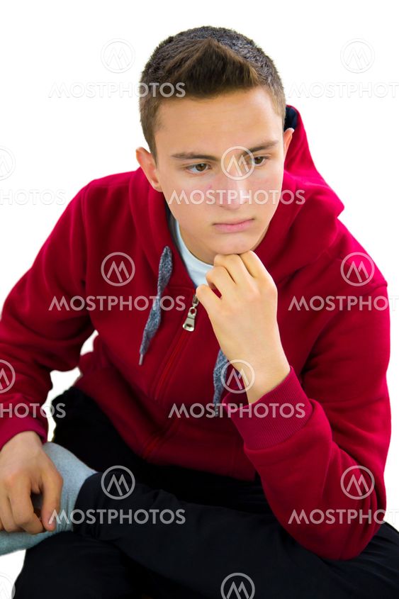 Portrait of teenage boy looking down