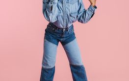 Young black woman screaming and pointing finger aside