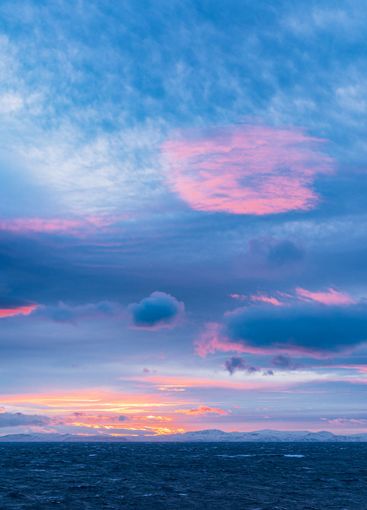 Sunset in winter on the coast of Finnmark in Norway