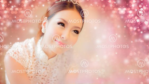 Pretty asian girl with pink bokeh