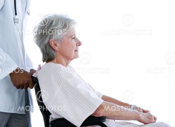 Portrait of a senior woman sitting on a wheelchair