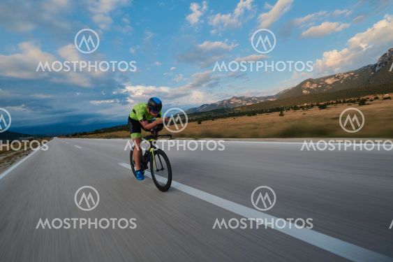 triathlon athlete riding bike