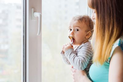 Happy mother with adorable baby