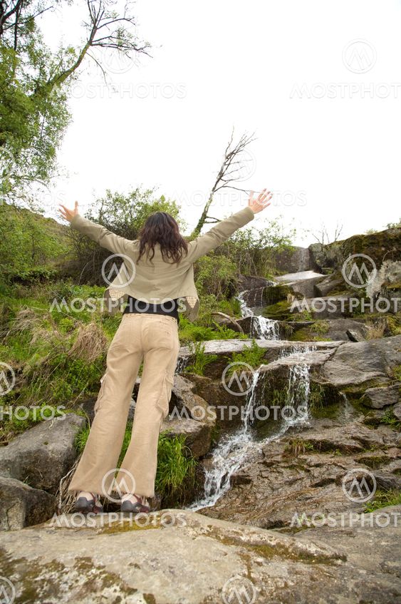 woman enjoy a torrent