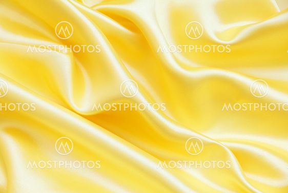 Smooth elegant golden silk as background