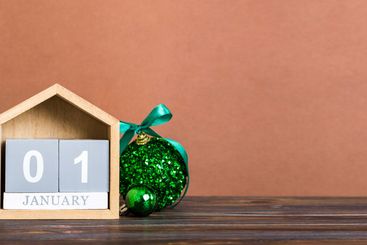 1 january. Christmas composition on colored background...