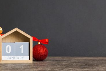 1 january. Christmas composition on colored background...