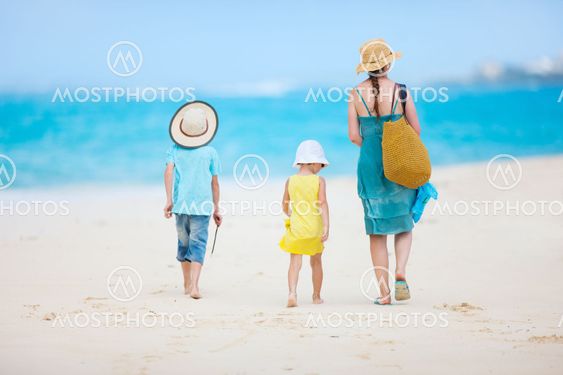 Mother and kids on a tropical beach