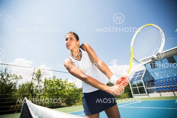 Young woman playing tennis
