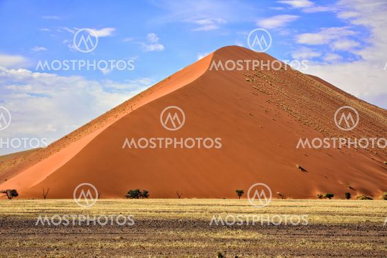 a vast orange dune at Sossusvlei namib naukluft park namibia africa