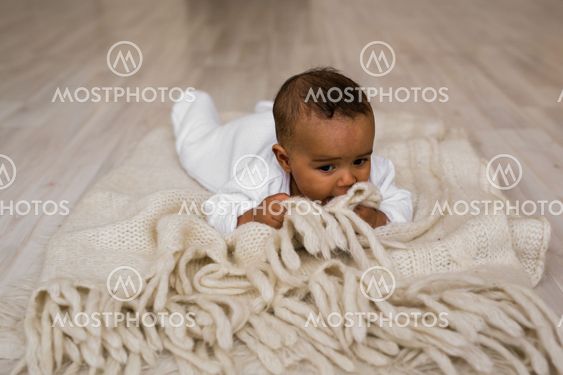 African American Baby Boy Lying