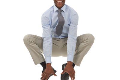 Happy businessman, portrait and jump in joy for...