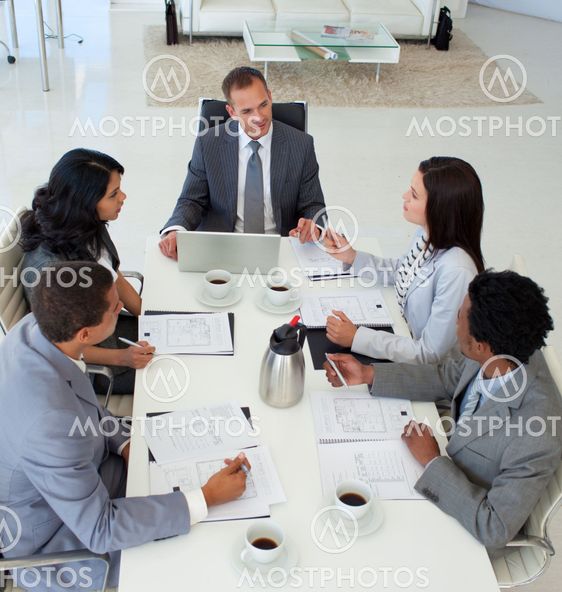 High angle of business people discussing in office a plan