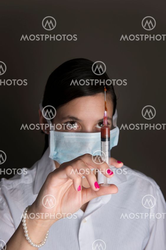 Beautiful women holding syringe