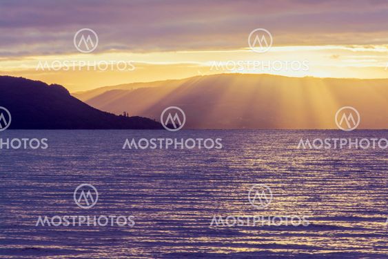 Lake Rotorua at cloudy sunrise, North Island, New Zealand