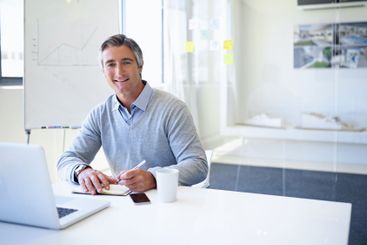 Office, mature businessman and portrait with notebook...