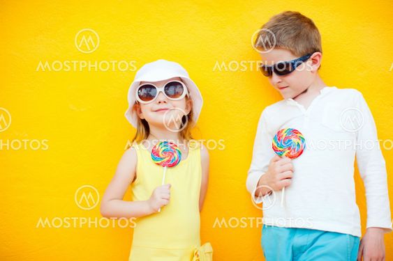 Kids with lollipops