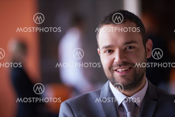 young business man portrait at modern office