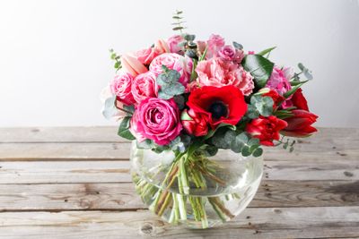 Bouquet of pink roses and Other colors flowers on wooden...