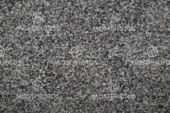 Closeup of dark grey granite texture