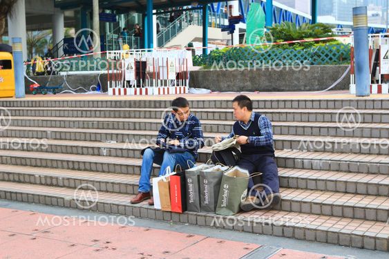 asian with shopping bags at hong kong