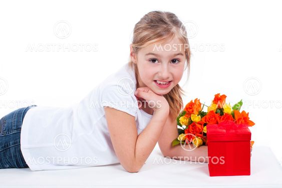 Young girl with flowers and gift