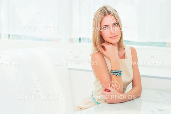 portrait of a beautiful woman in the cafe