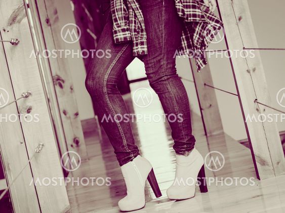 Woman wear casual clothes high heels indoor.