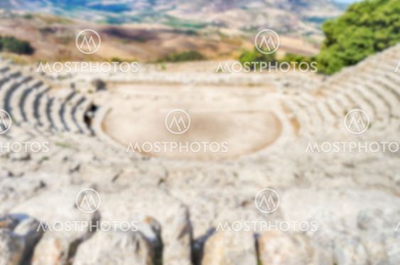 Defocused background with the Greek Theatre of Segesta,...