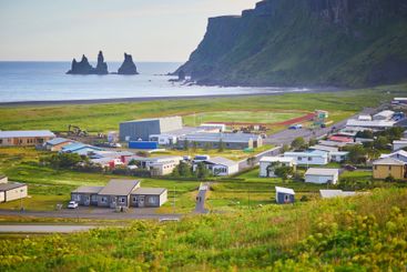 Scenic view of Vik village with ocean coast in Southern...